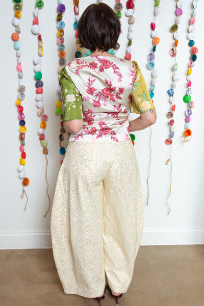 Back view of the Bon Top showing the cream and pink floral back panel