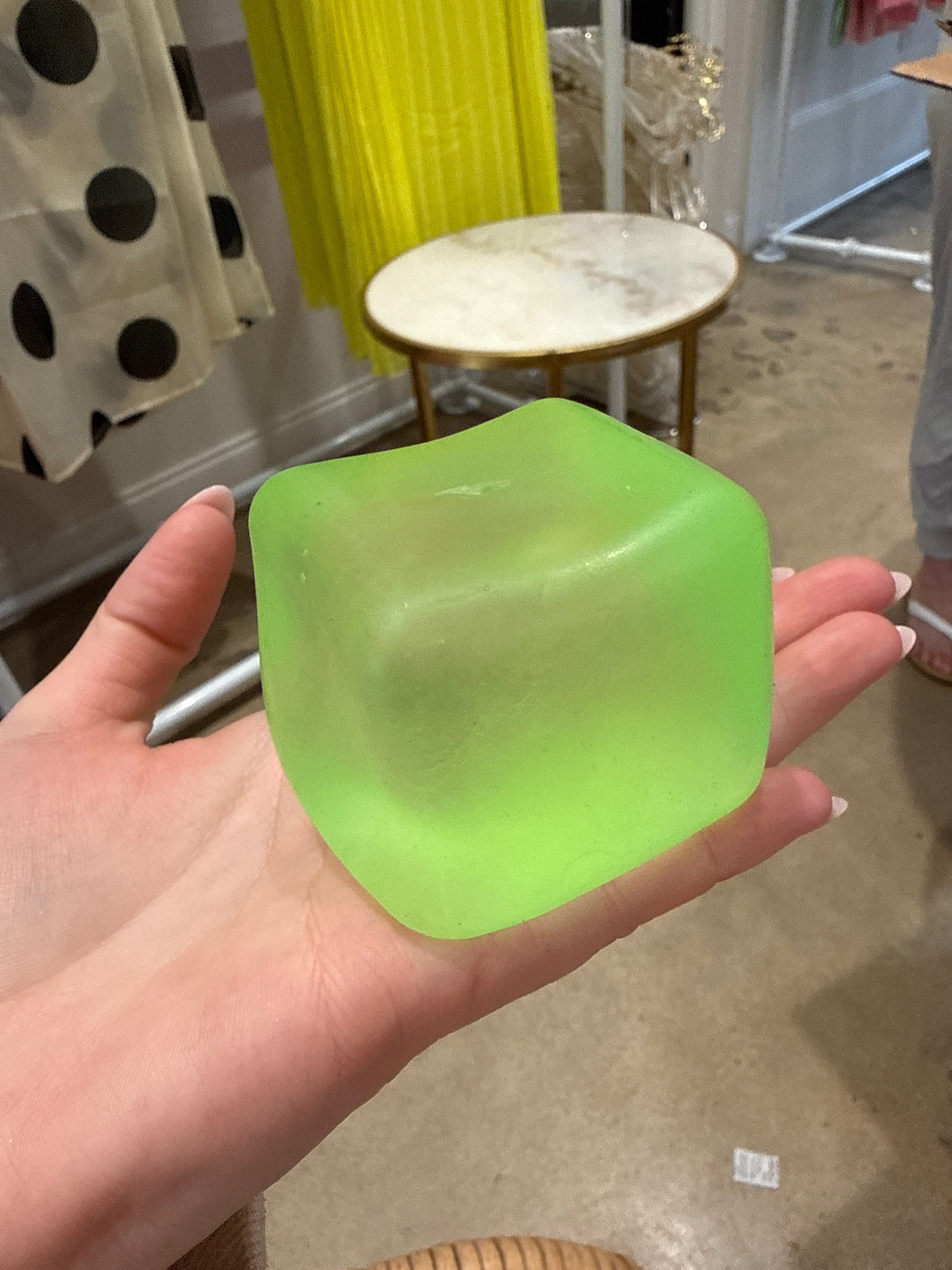 Slow rise squeeze cube
