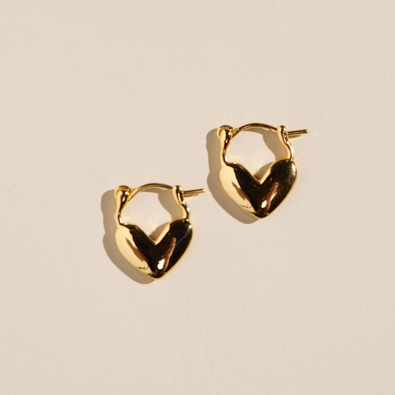 Nickel and Suede | Gold Heart Huggies